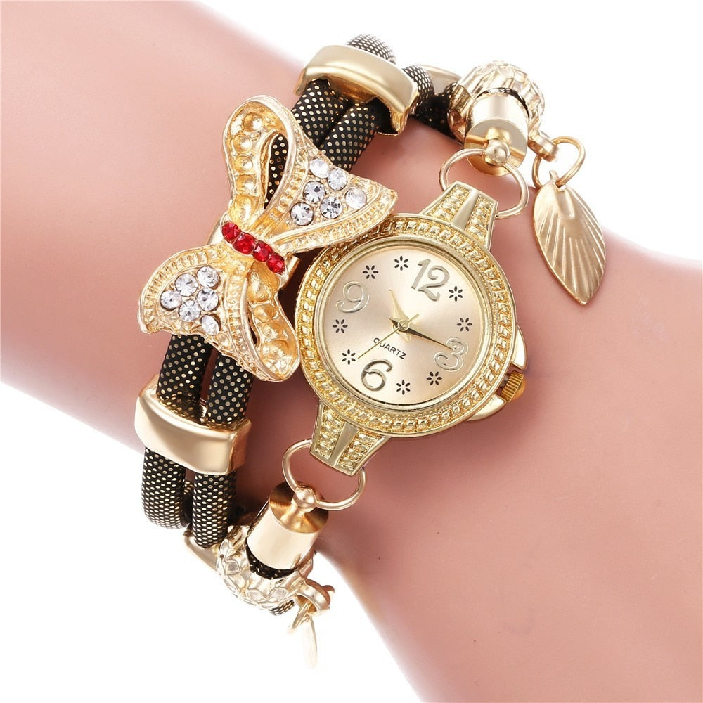 Hot selling retro bracelet watch women high quality exquisite bow-knot leave pendant quartz relogio feminino reloj mujer watches